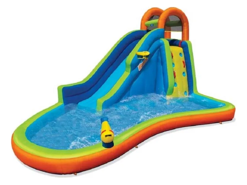 BANZAI Big Blast water park with a long blue slide, a climbing wall, an arch on top and a curving rainbow-striped splash pool with a water cannon